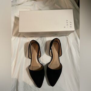 Black suede pointed toe flats